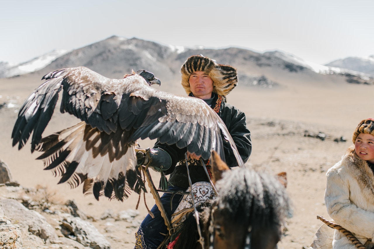 How to Keep Your Exotic Pet Safe from Predators, Mongolian hunters with a hawk